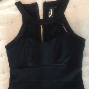 Flattering cage cut little black dress